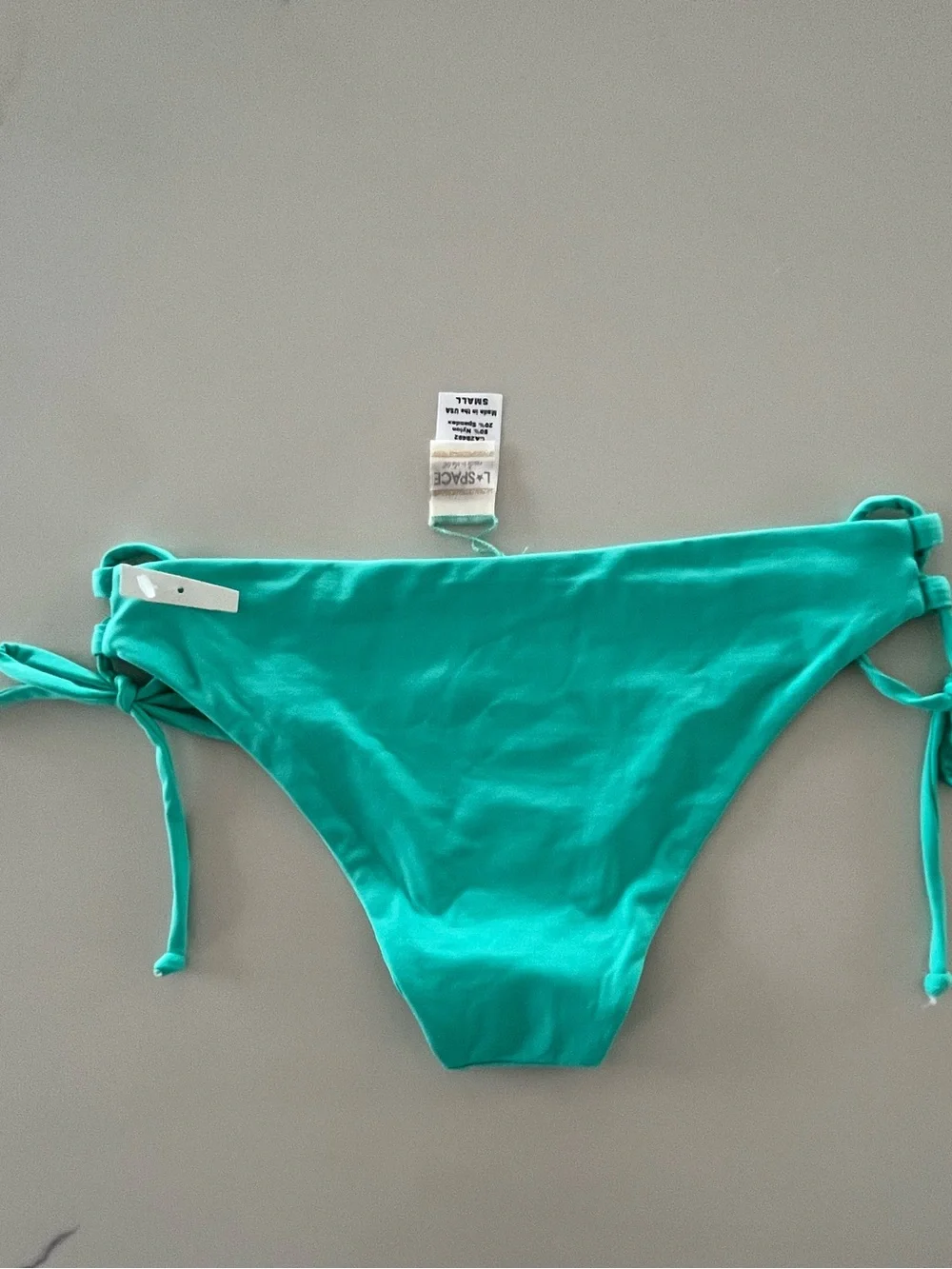 L*SPACE Gazebo Caribbean Teal Lattice Macrame Side Tie Bikini Bottoms Small NWOT